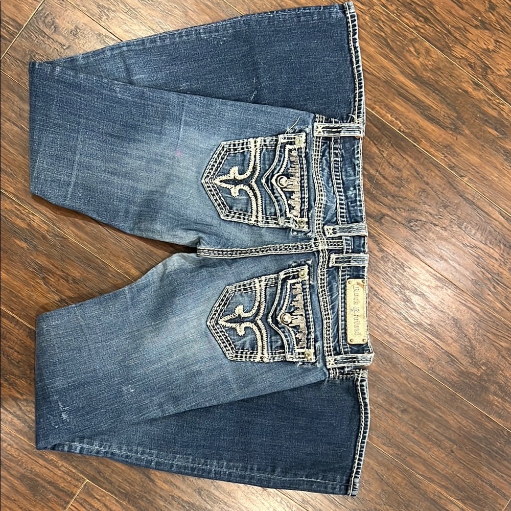 Rock Revival Boot Cut Jeans with Vintage Distressing